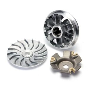 Metallic engine parts with intricate designs.